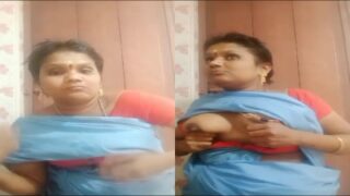 Office maid aunty blouse kazhati mulai kattukiral